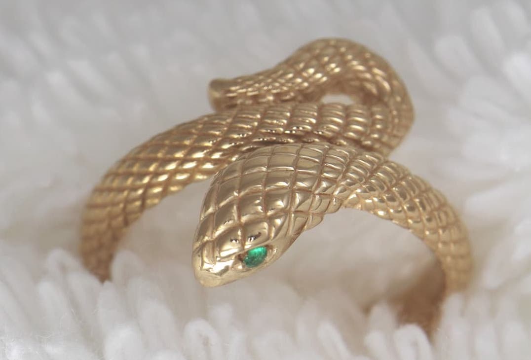 The Enchanting Tale of Our Custom 22K Gold Serpent Ring with Emerald Eyes