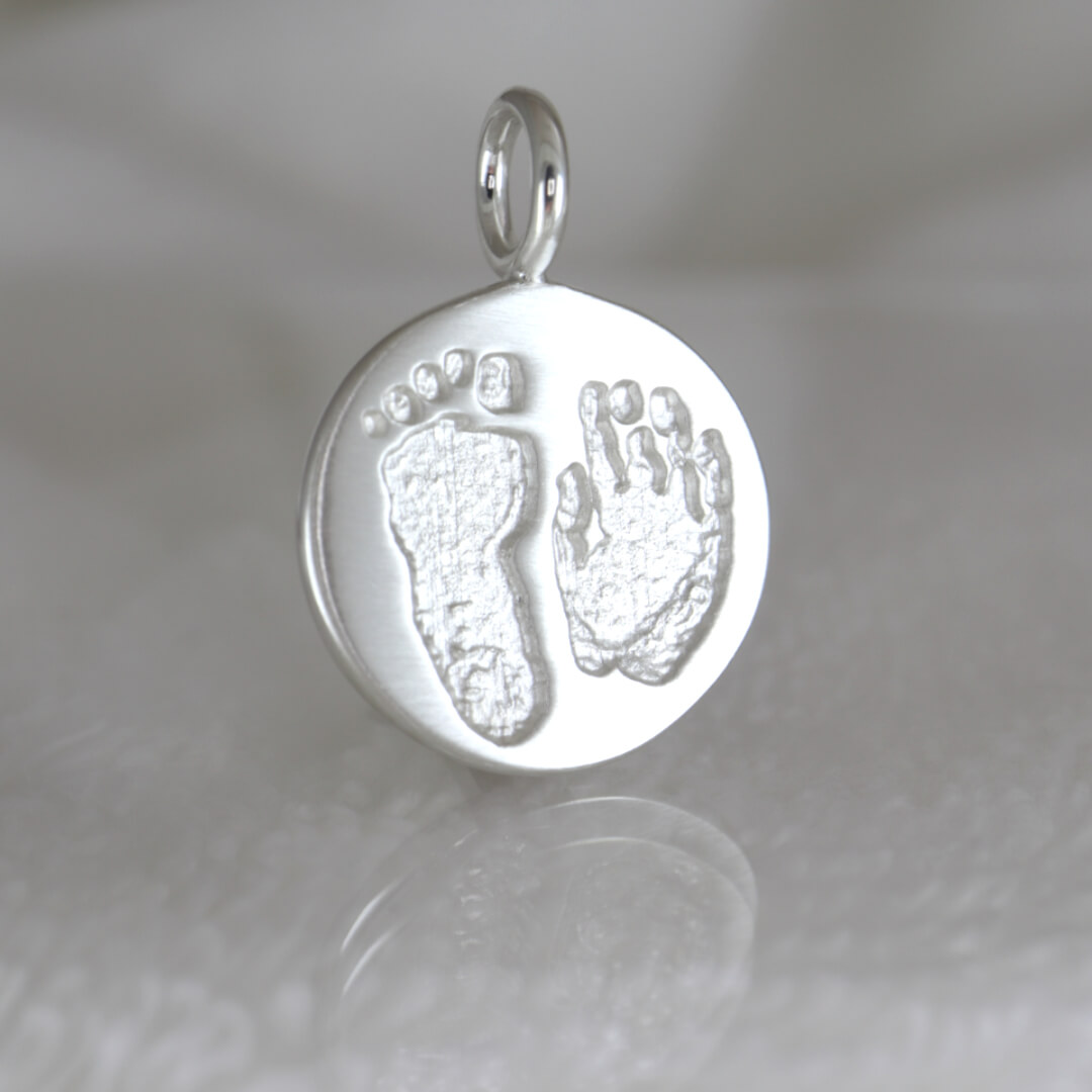 Choosing the Perfect Memorial Gift A Guide to Meaningful Jewelry Hand and foot print jewelry silver 2025 01 07 Choosing the Perfect Memorial Gift A Guide to Meaningful Jewelry Hand and foot print jewelry silver 2025 01 07