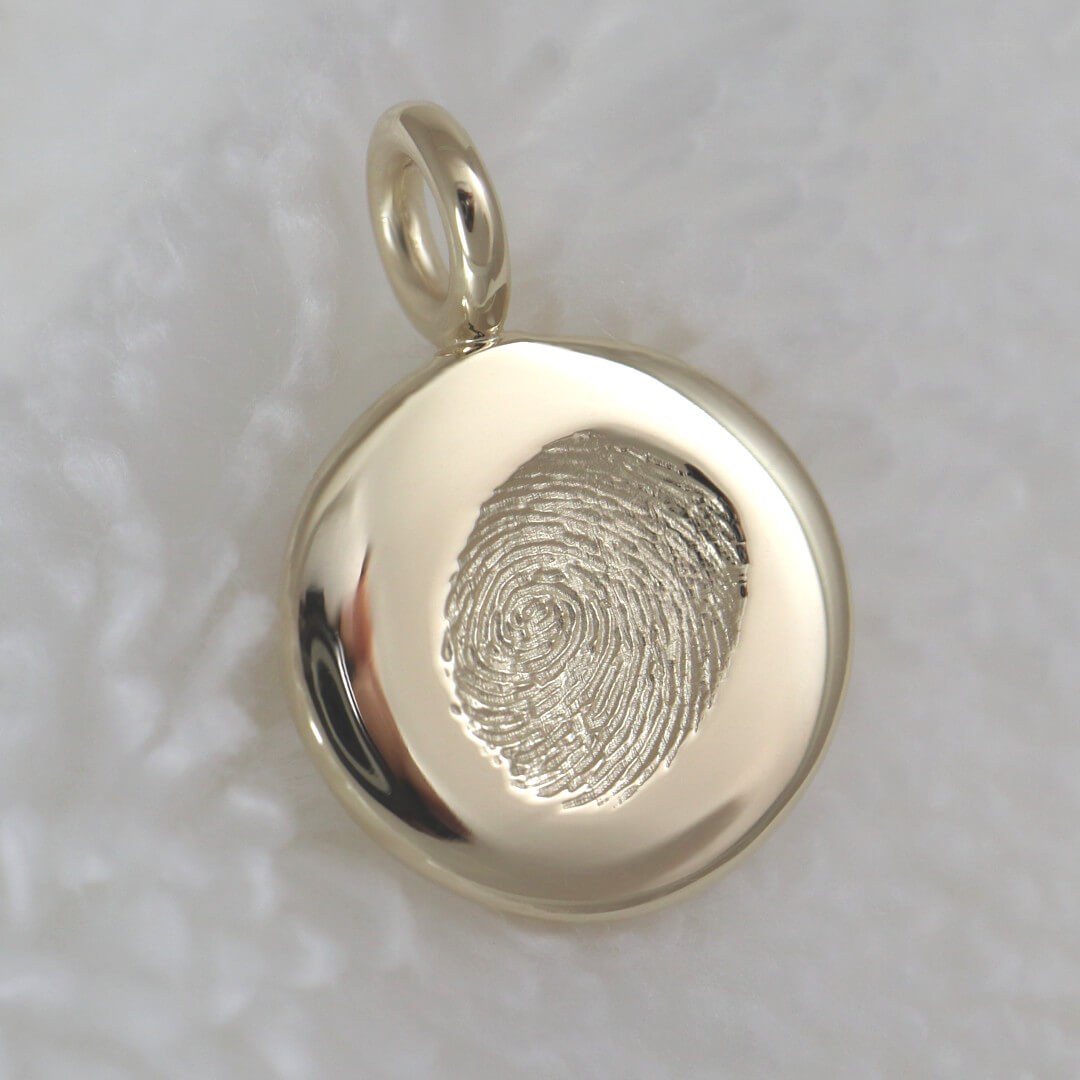 The Art of Memorial Jewelry Yellow Gold Baby Fingerprint Charm Closeup